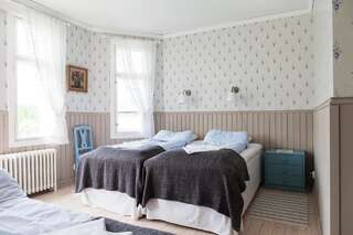Отели типа «постель и завтрак» Amalia Lemland Четырехместный номер с общей ванной комнатой-1